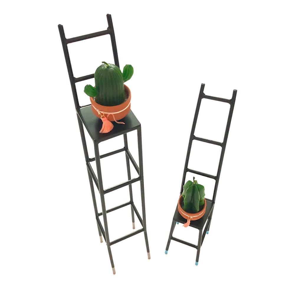 Chairs With a Cactus Candle